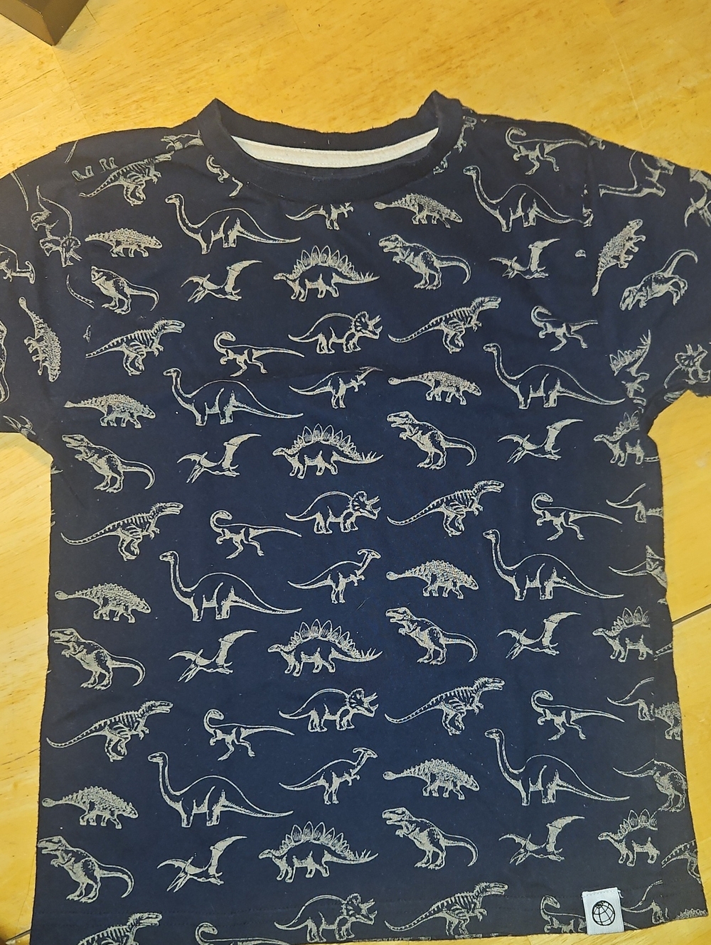 Free Planet Navy Blue Short Sleeve Tee with White Dinosaur Print